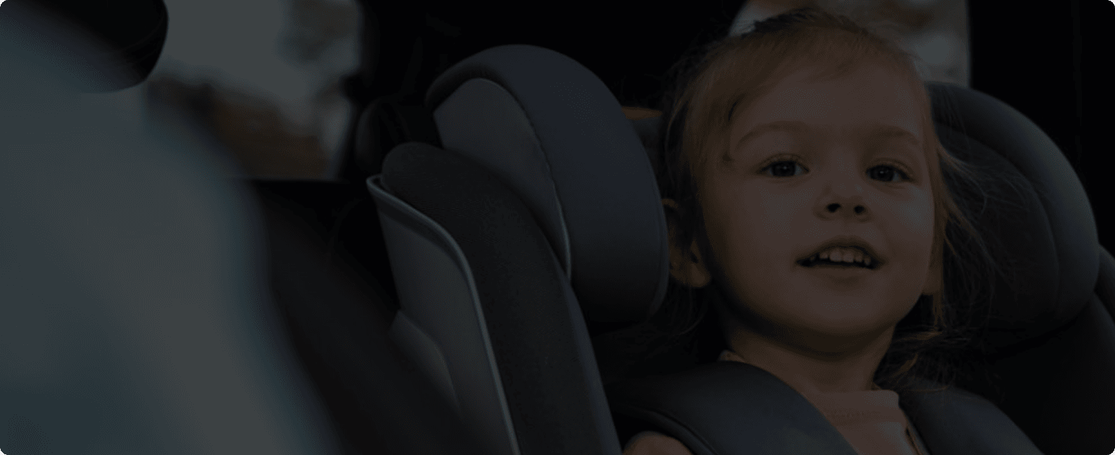 Child safely seated in car